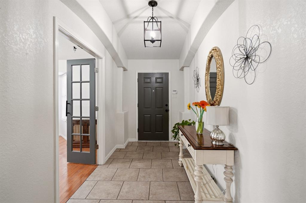 1213 Hampton Drive Forney, TX 75126 - Photo 2 of 27 a front view of a house with entryway