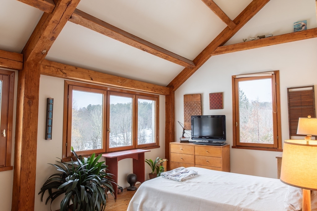 45 Sessions Road Hardwick, MA 01037 - Photo 12 of 28 a bedroom with furniture and large windows
