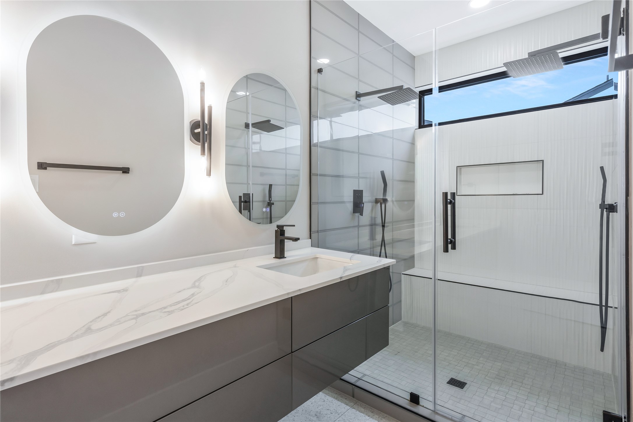 2237 Blalock Road Houston, TX 77080 - Photo 24 of 33 a bathroom with a sink and mirror