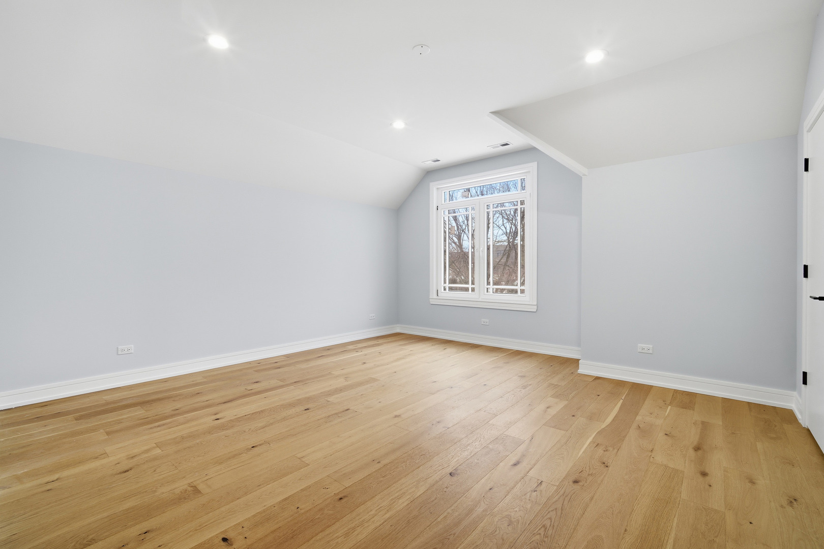 38 Washington Street Glenview, IL 60025 - Photo 12 of 27 an empty room with wooden floor and windows