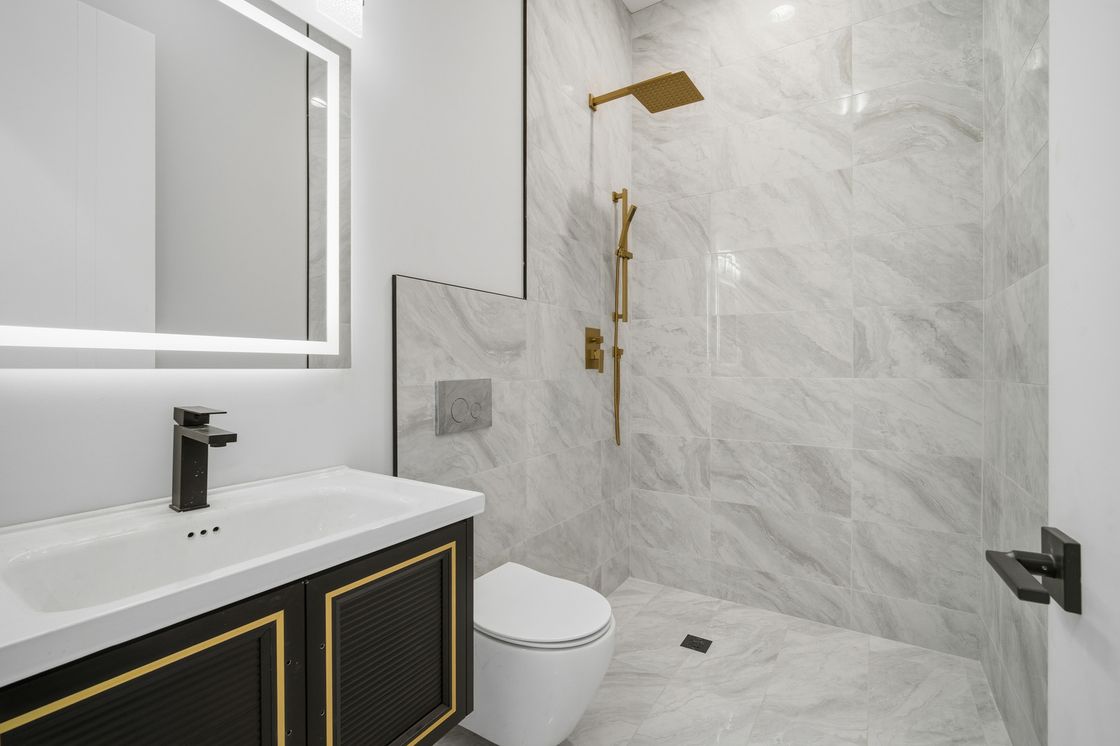 38 Washington Street Glenview, IL 60025 - Photo 13 of 27 a bathroom with a sink toilet and shower