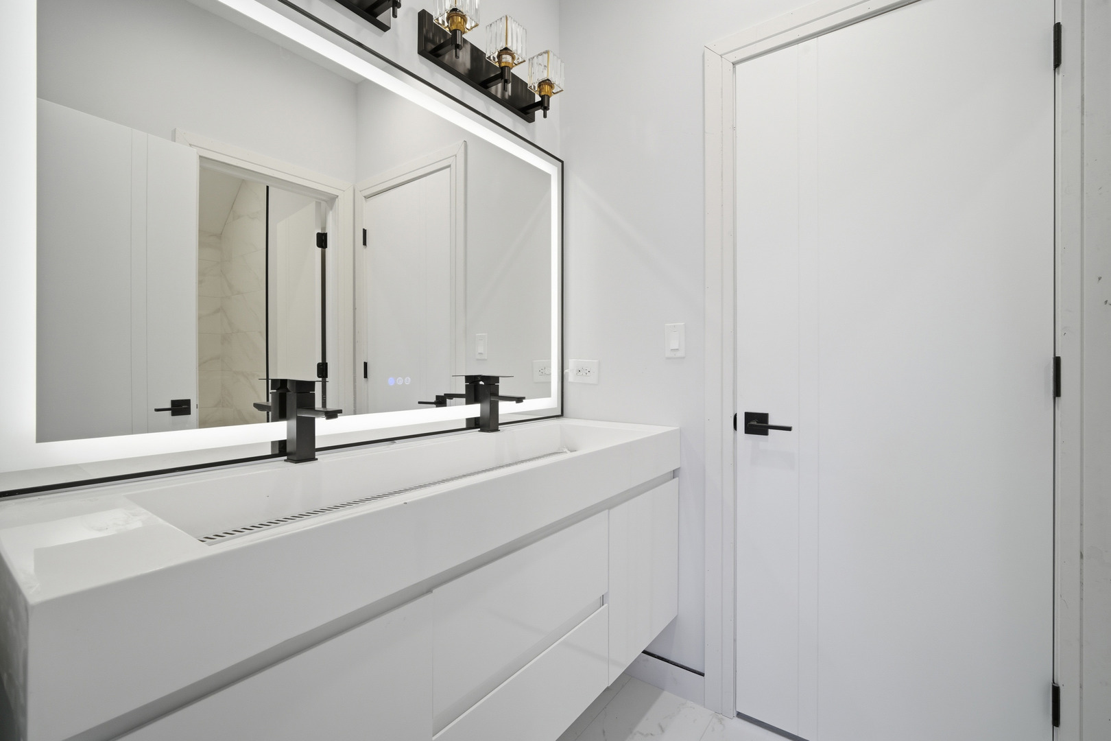 38 Washington Street Glenview, IL 60025 - Photo 14 of 27 a bathroom with a sink and a mirror