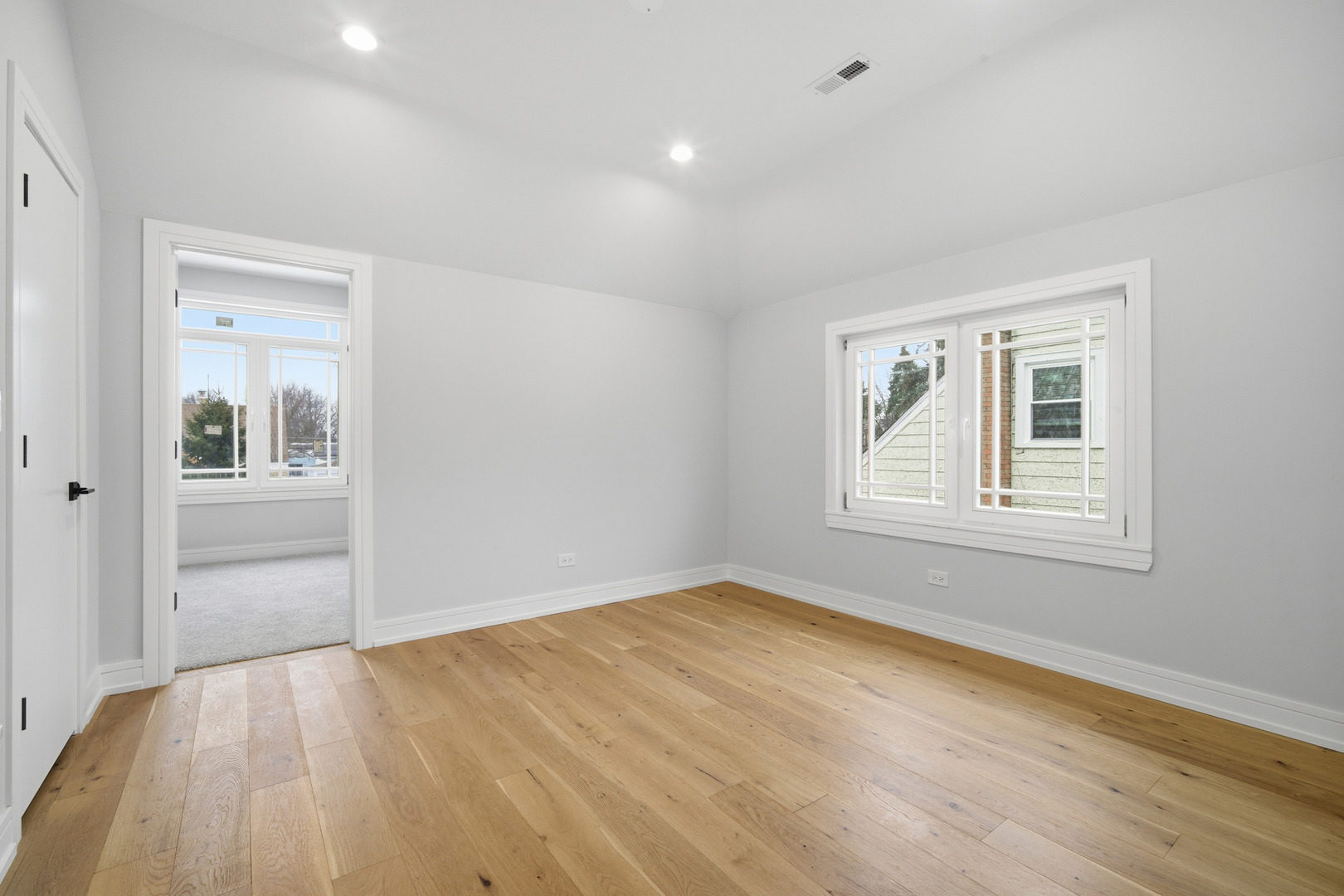 38 Washington Street Glenview, IL 60025 - Photo 15 of 27 a view of empty room with wooden floor and fan