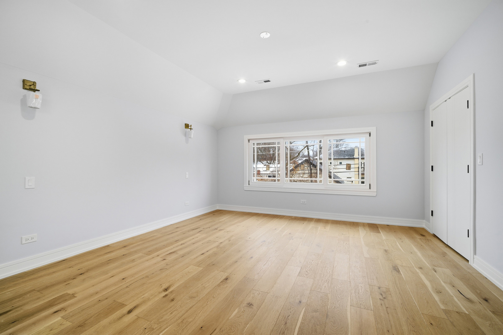 38 Washington Street Glenview, IL 60025 - Photo 18 of 27 an empty room with wooden floor and windows