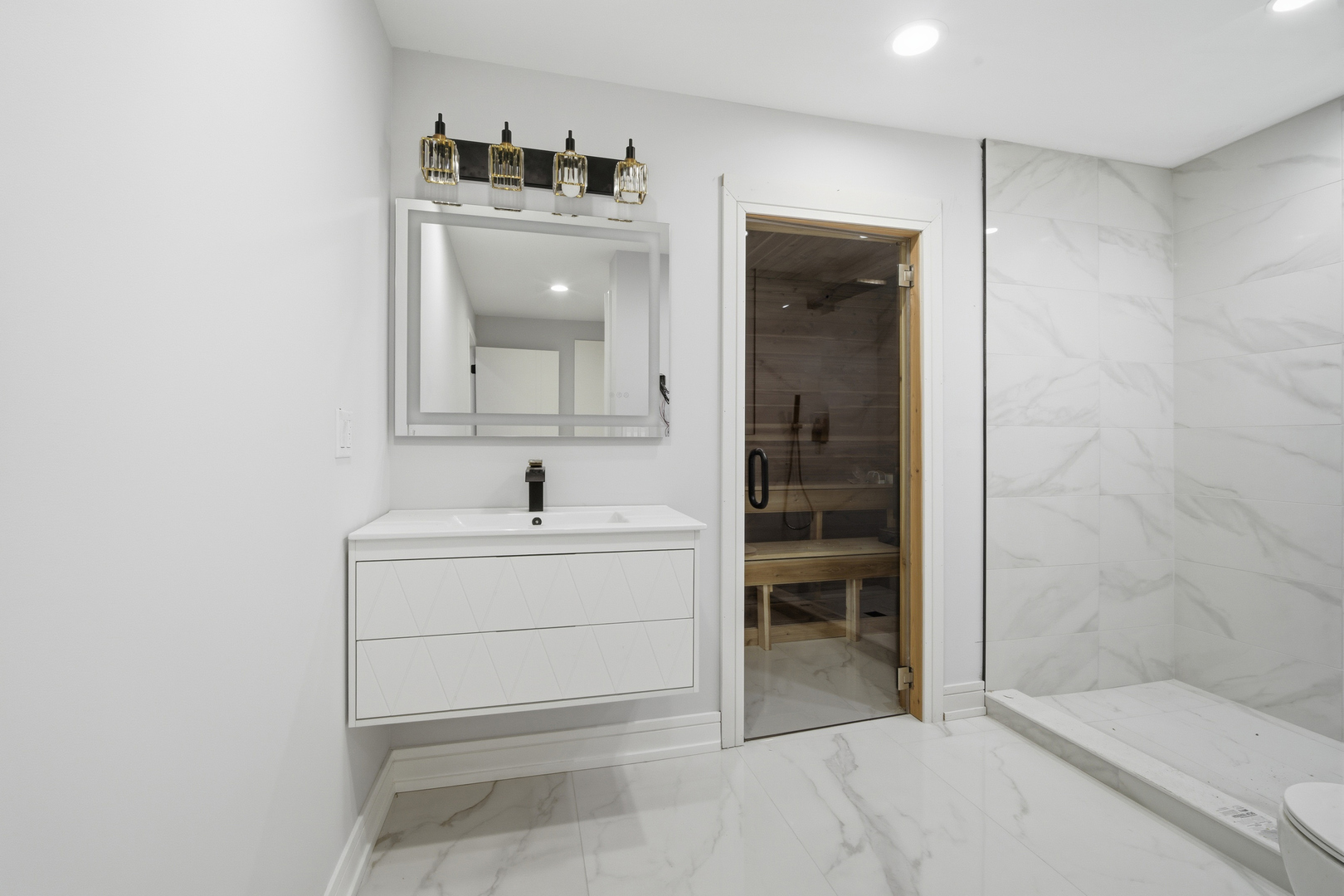 38 Washington Street Glenview, IL 60025 - Photo 22 of 27 a bathroom with a sink mirror and a bathtub