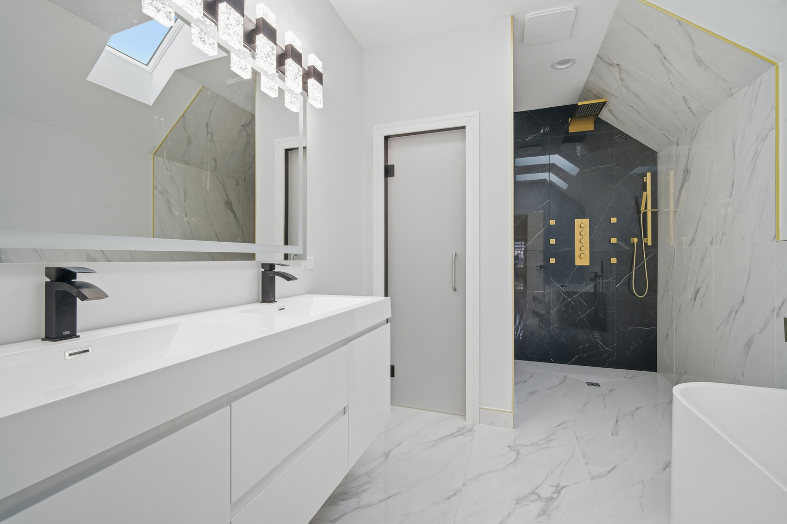 38 Washington Street Glenview, IL 60025 - Photo 10 of 27 a en suite bathroom with a sink a toilet and shower