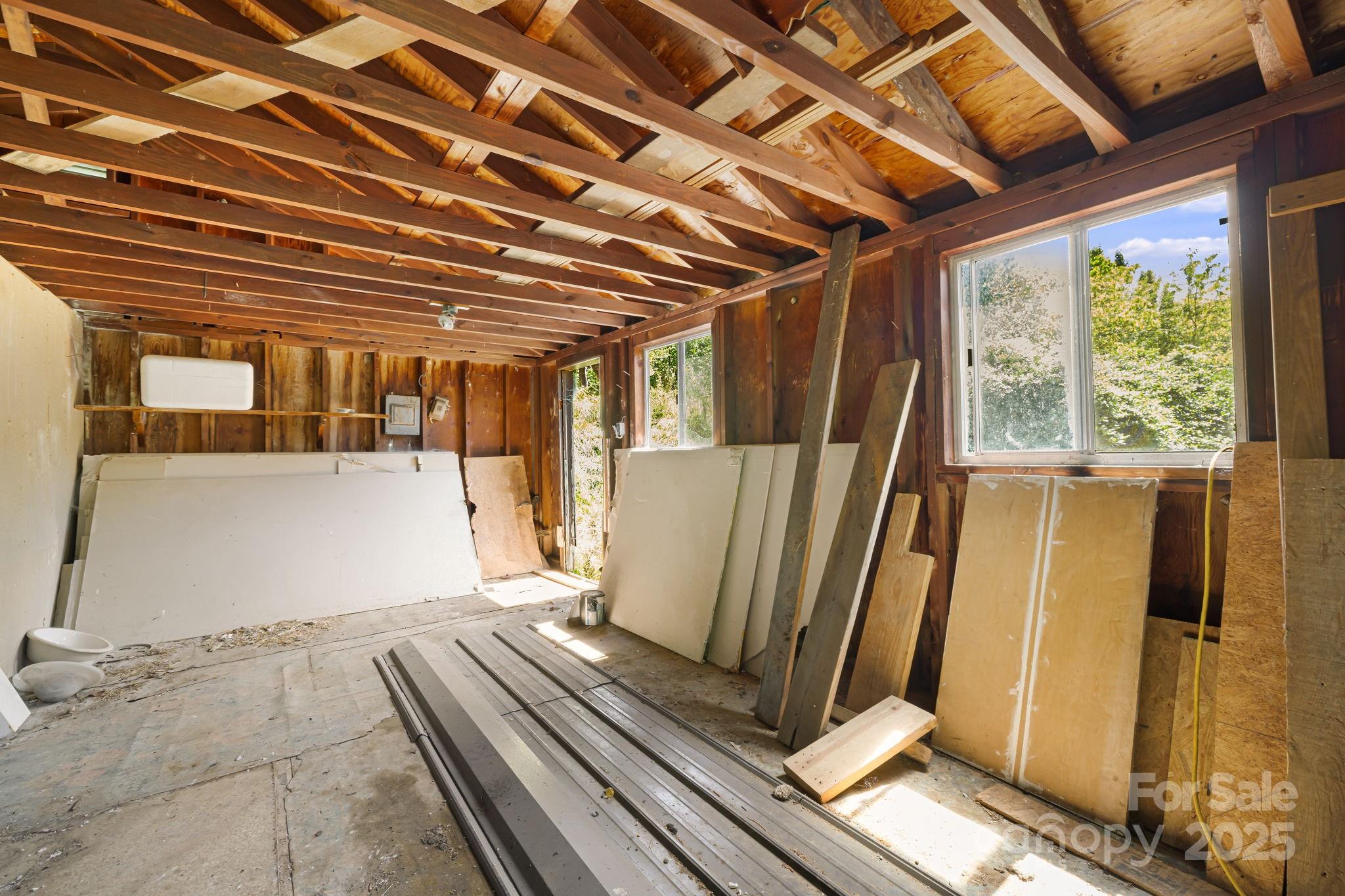 1277 Henson Cove Road Canton, NC 28716 - Photo 19 of 21 a view of a refrigerator in kitchen