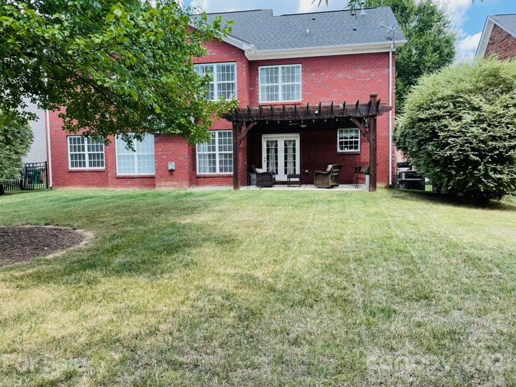 6008 Colton Ridge Drive Indian Trail, NC 28079 - Photo 3 of 14 a view of a house with a yard and tree
