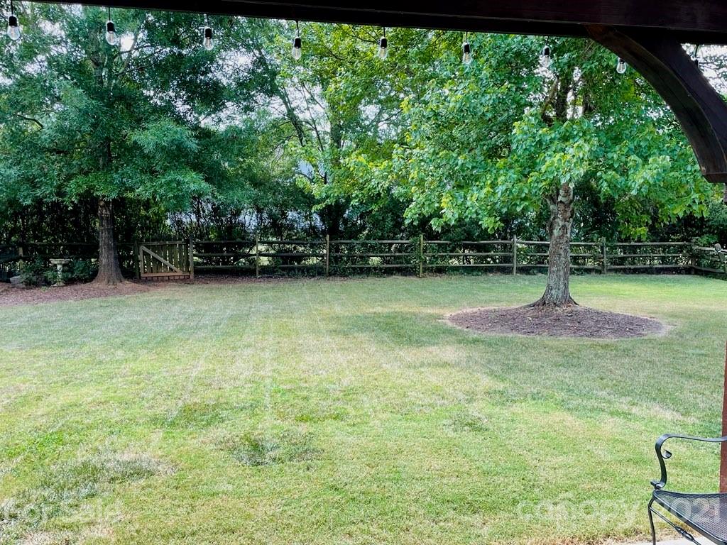 6008 Colton Ridge Drive Indian Trail, NC 28079 - Photo 5 of 14 a view of a tree in a yard