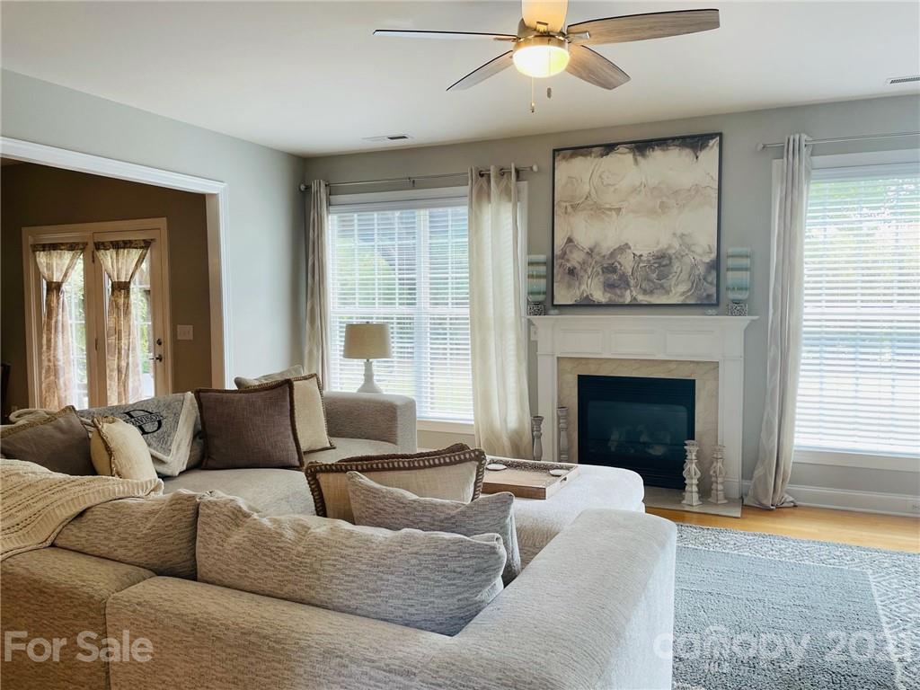 6008 Colton Ridge Drive Indian Trail, NC 28079 - Photo 10 of 14 a living room with furniture and a fireplace