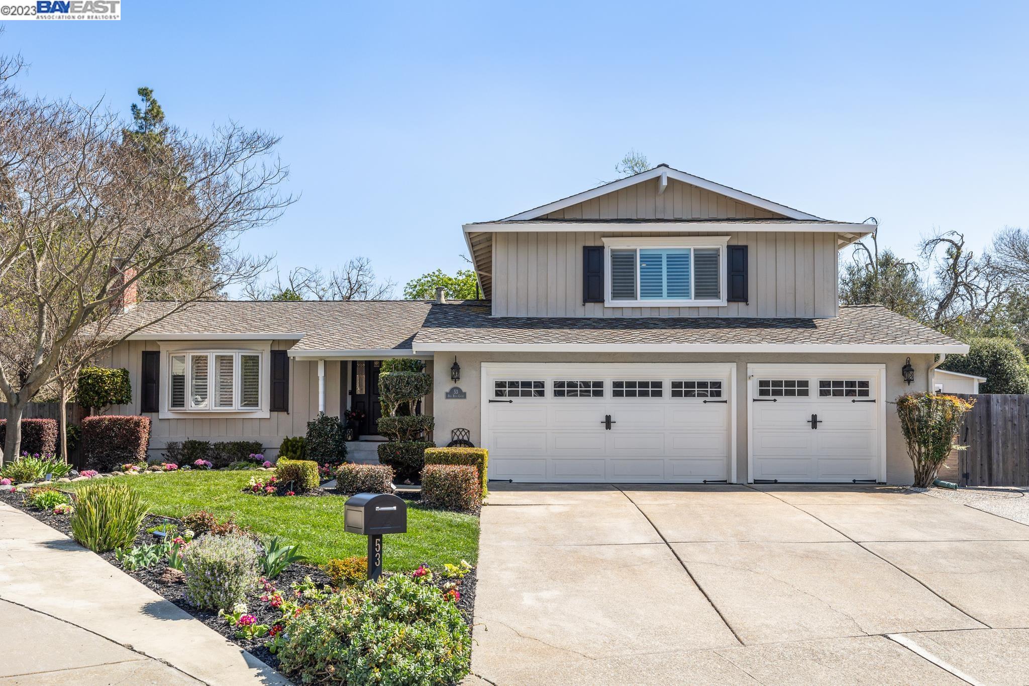 53 Dos Rios Court San Ramon, CA 94583 - Photo 1 of 1 a front view of a house with a garden