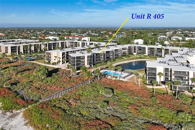 a view of a lake with a building in the background