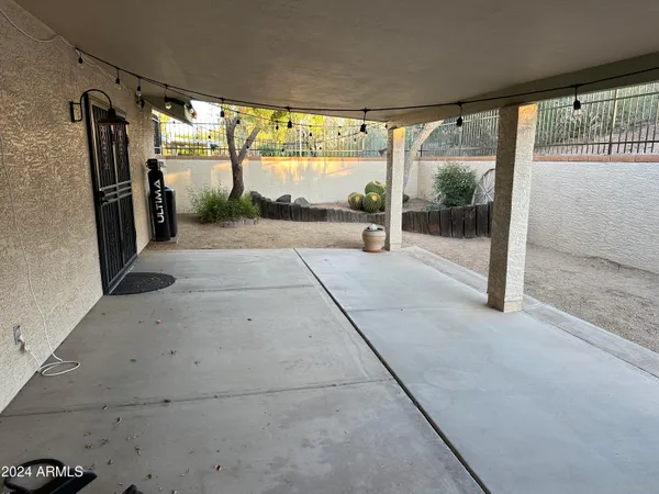 a view of a glass door with an outdoor space