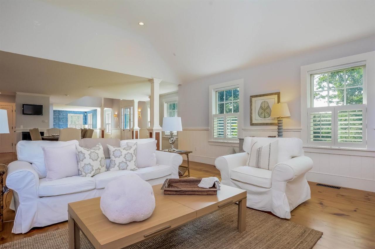 56 Sears Road Chatham, MA 02633 - Photo 2 of 14 a living room with furniture and a large window