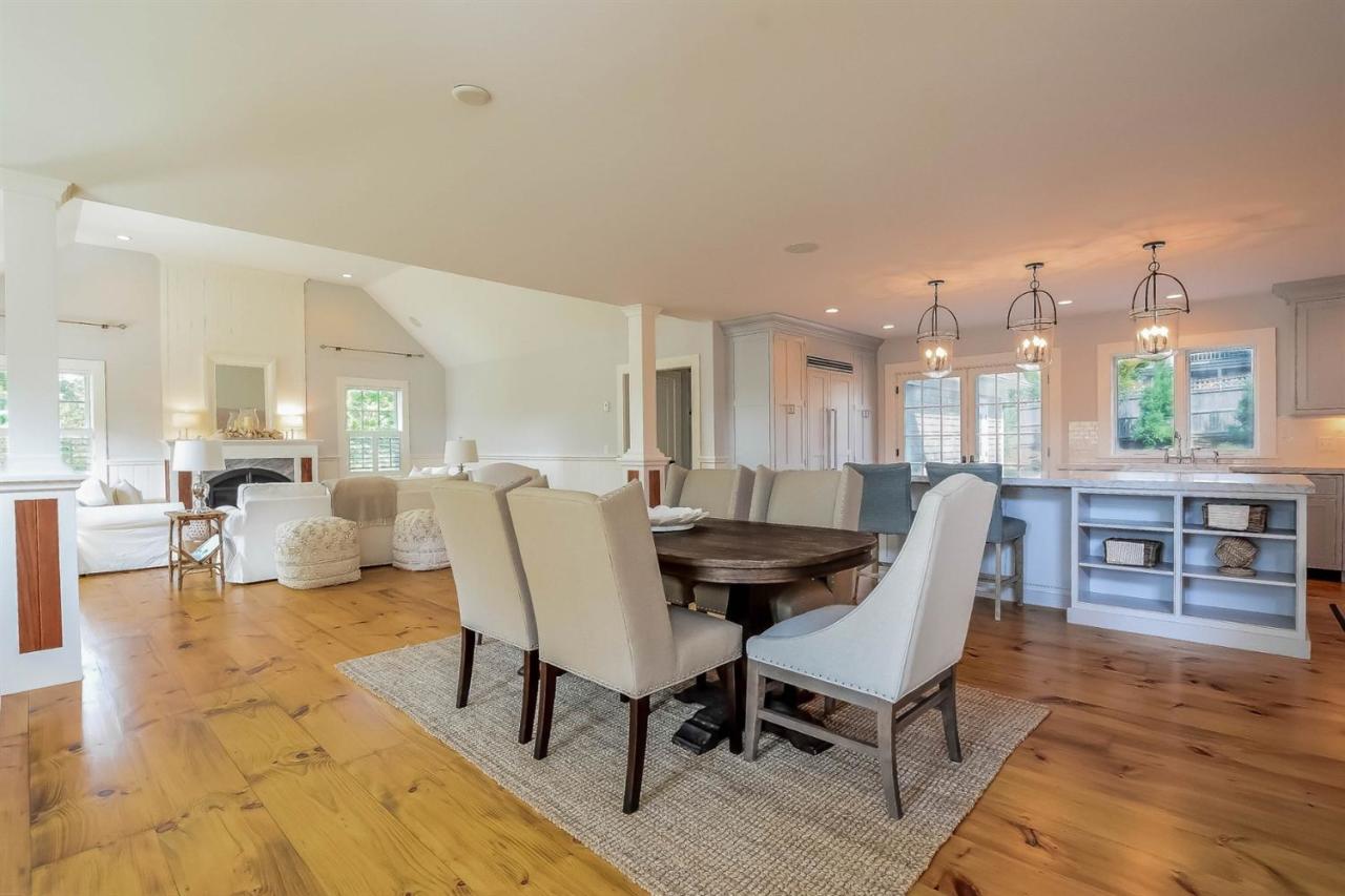 56 Sears Road Chatham, MA 02633 - Photo 4 of 14 a living room with furniture a dining table and a potted plant