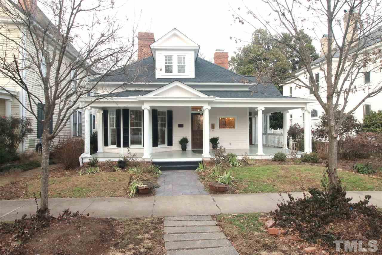 407 Polk Street Raleigh, NC 27604 - Photo 3 of 25 a front view of a house with a yard