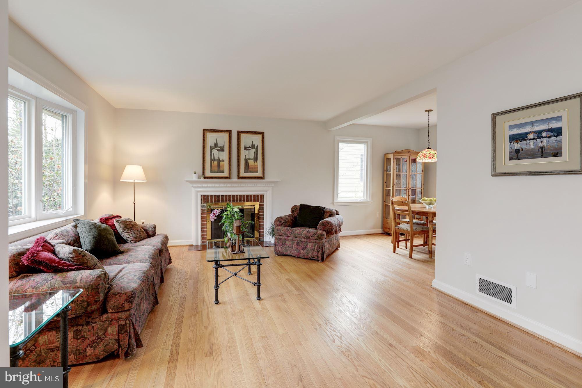 5308 Waneta Road Bethesda, MD 20816 - Photo 3 of 20 Sunny Living Room with fireplace, large bay window