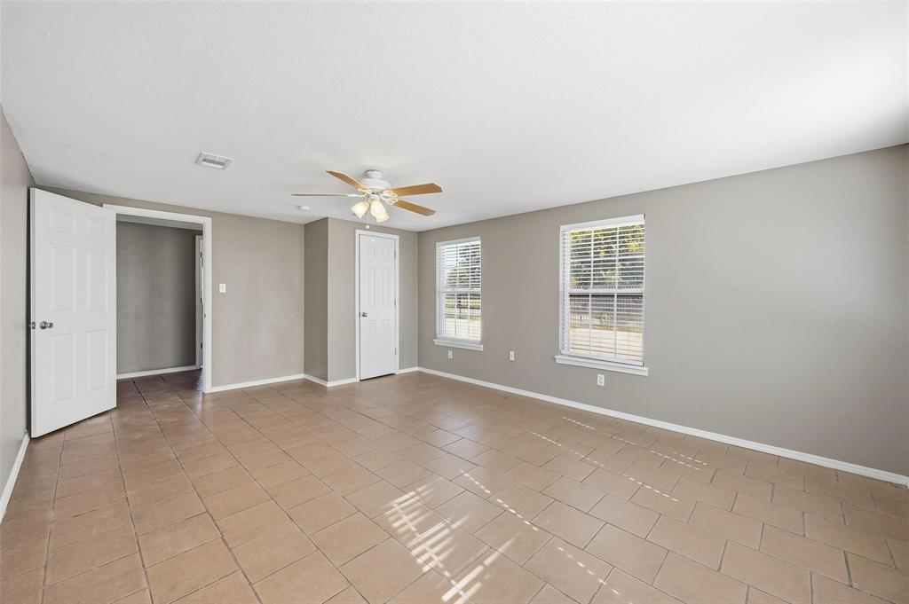 13485 Liberty School Road, Unit 1 Azle, TX 76020 - Photo 14 of 21 a view of an empty room with a window