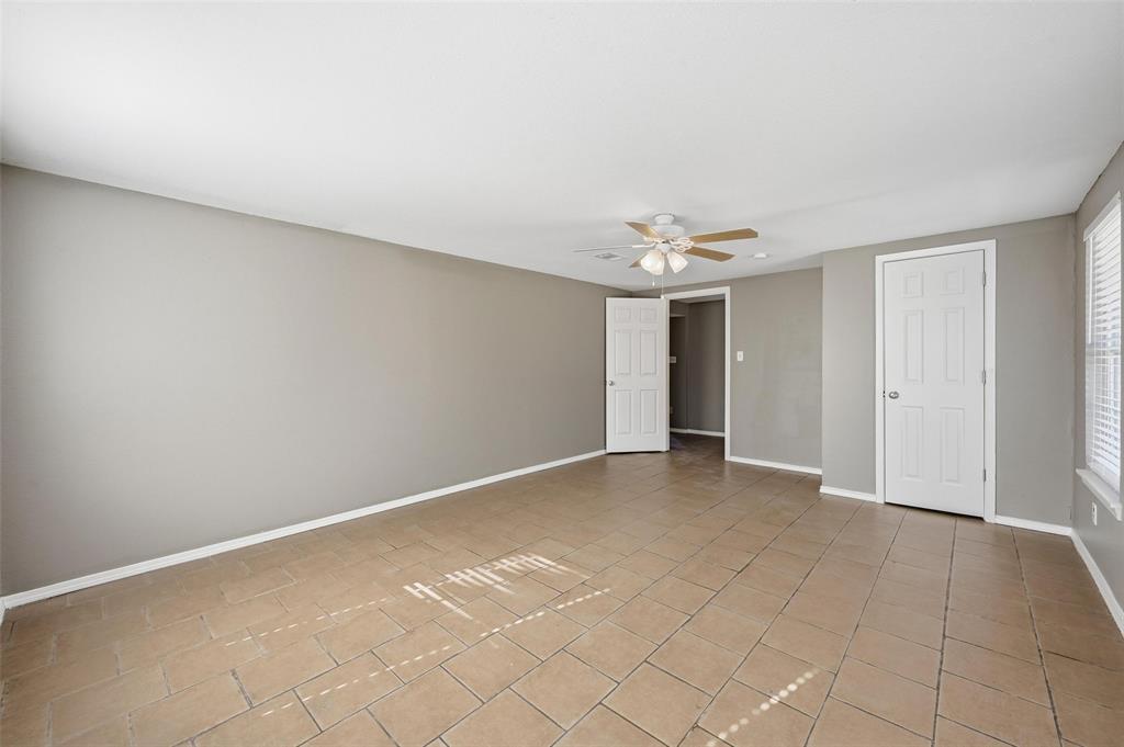 13485 Liberty School Road, Unit 1 Azle, TX 76020 - Photo 15 of 21 a view of an empty room with a window