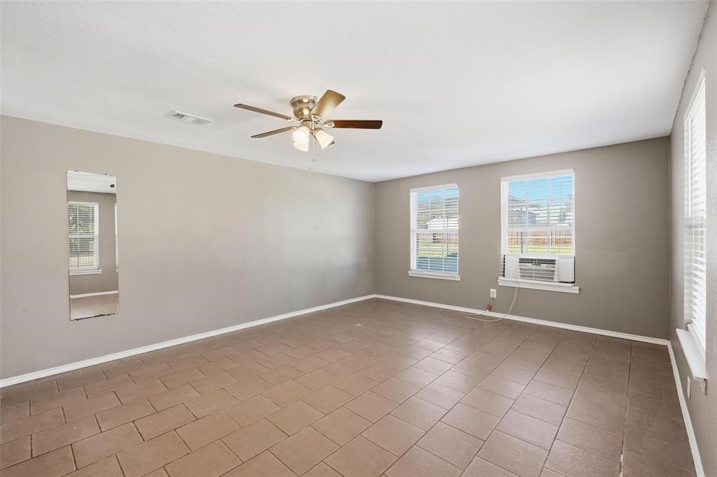 13485 Liberty School Road, Unit 1 Azle, TX 76020 - Photo 17 of 21 a view of an empty room with a window