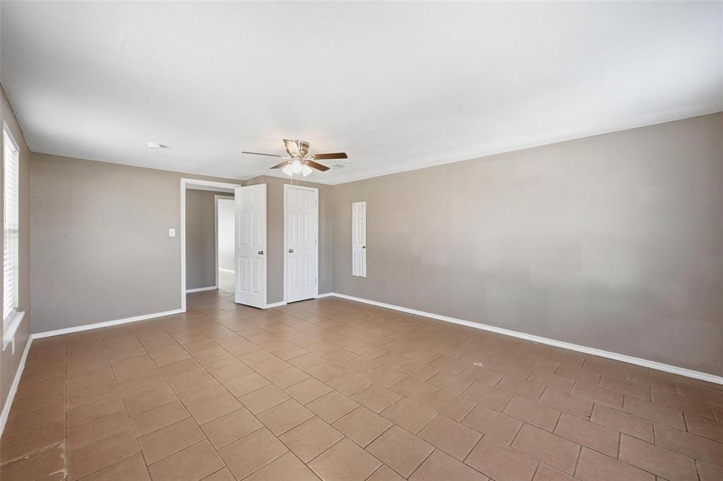13485 Liberty School Road, Unit 1 Azle, TX 76020 - Photo 18 of 21 an empty room with chandelier fan