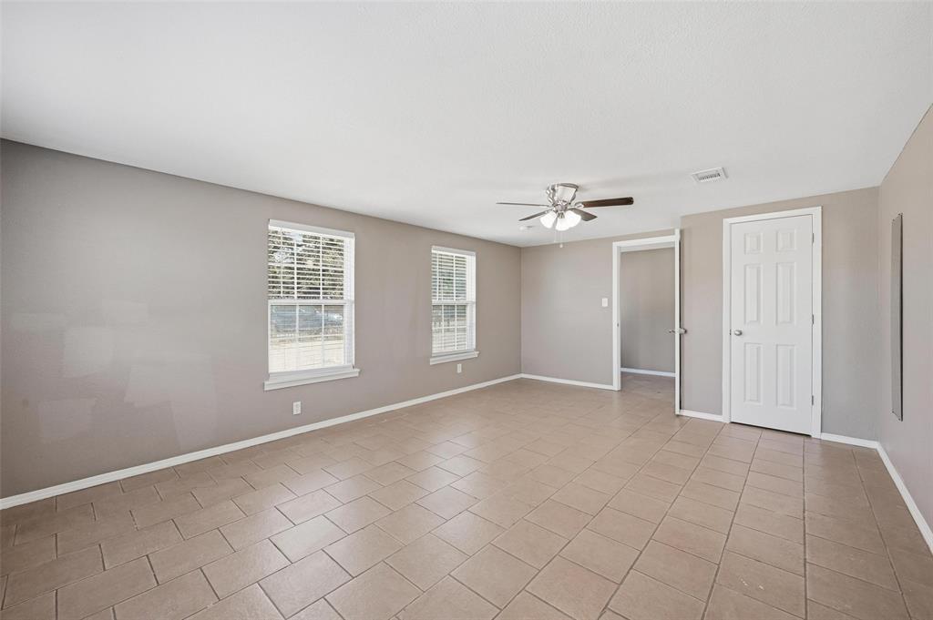 13485 Liberty School Road, Unit 1 Azle, TX 76020 - Photo 19 of 21 a view of an empty room with a window