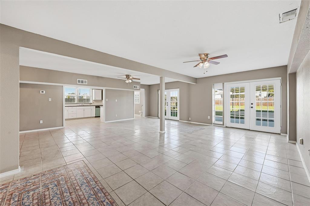 13485 Liberty School Road, Unit 1 Azle, TX 76020 - Photo 3 of 21 a view of an empty room with a window