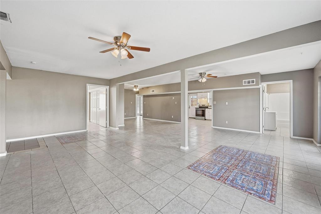 13485 Liberty School Road, Unit 1 Azle, TX 76020 - Photo 6 of 21 wooden floor in an empty room with a window