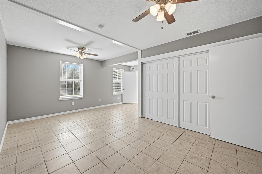 13485 Liberty School Road, Unit 1 Azle, TX 76020 - Photo 10 of 21 a view of an empty room with a window
