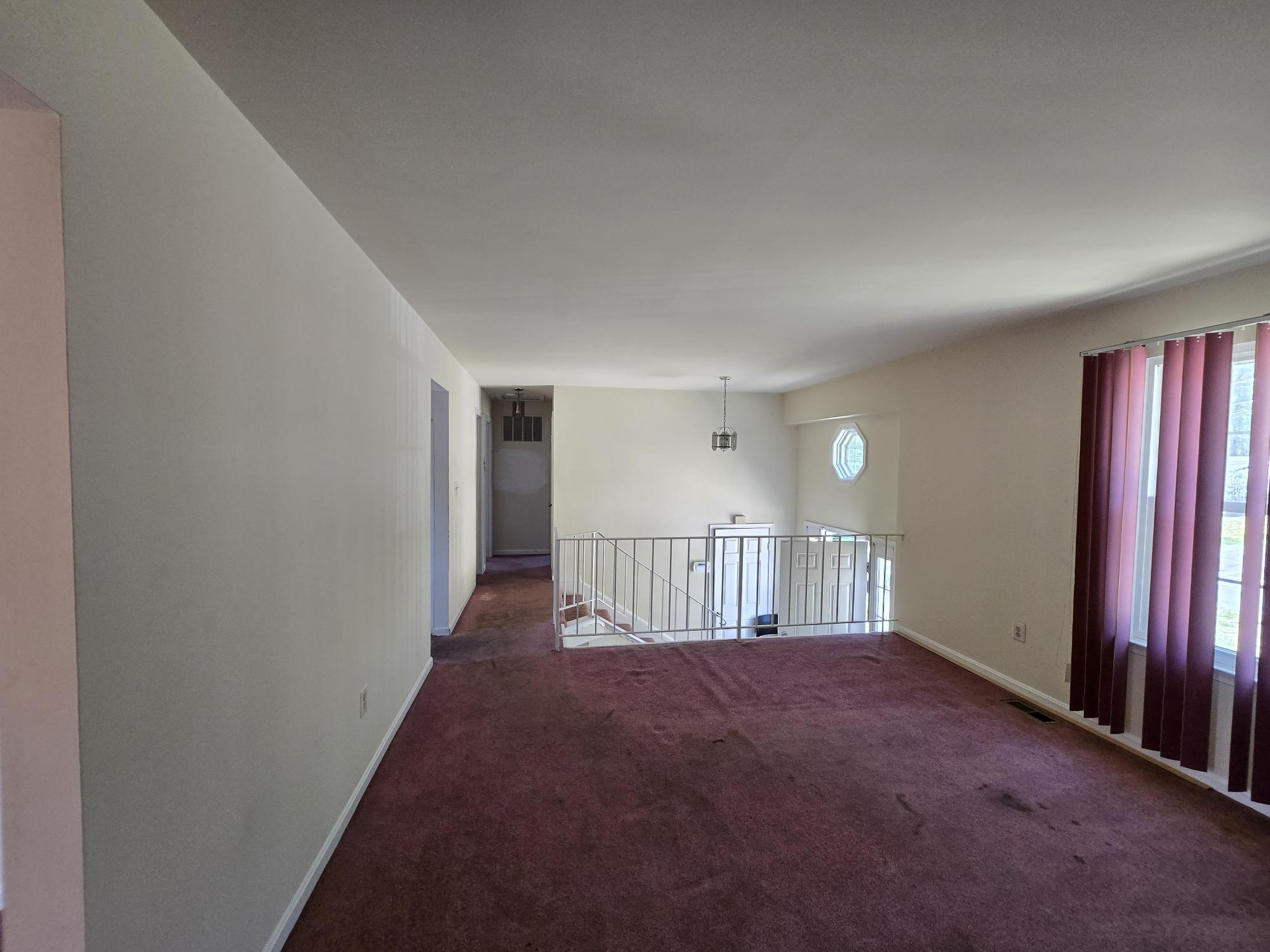 8510 Schultz Road Clinton, MD 20735 - Photo 3 of 16 Spacious living room & entryway w/ natural light.