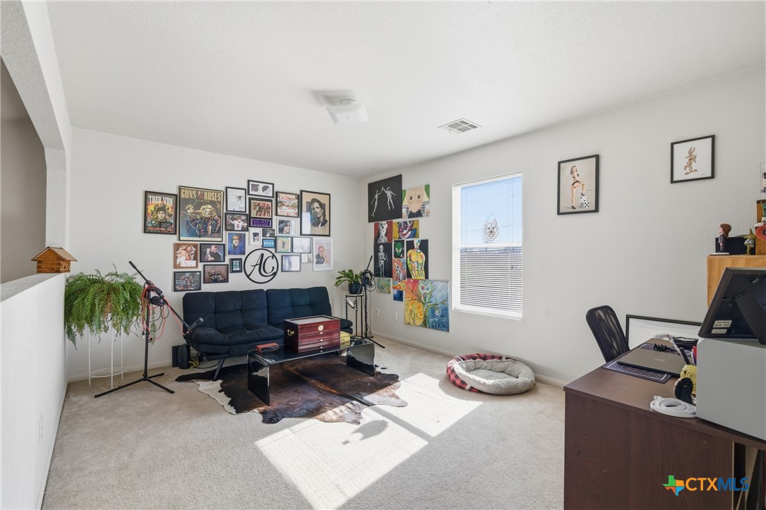 3310 Bull Run Drive Killeen, TX 76549 - Photo 17 of 27 a living room with furniture and a flat screen tv