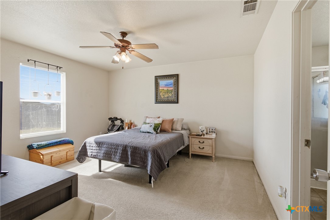 3310 Bull Run Drive Killeen, TX 76549 - Photo 10 of 27 a bedroom with a bed and a couch