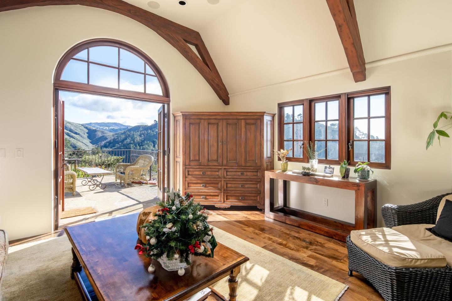 309 Mt Devon Road Carmel, CA 93923 - Photo 18 of 32 a living room with a large window