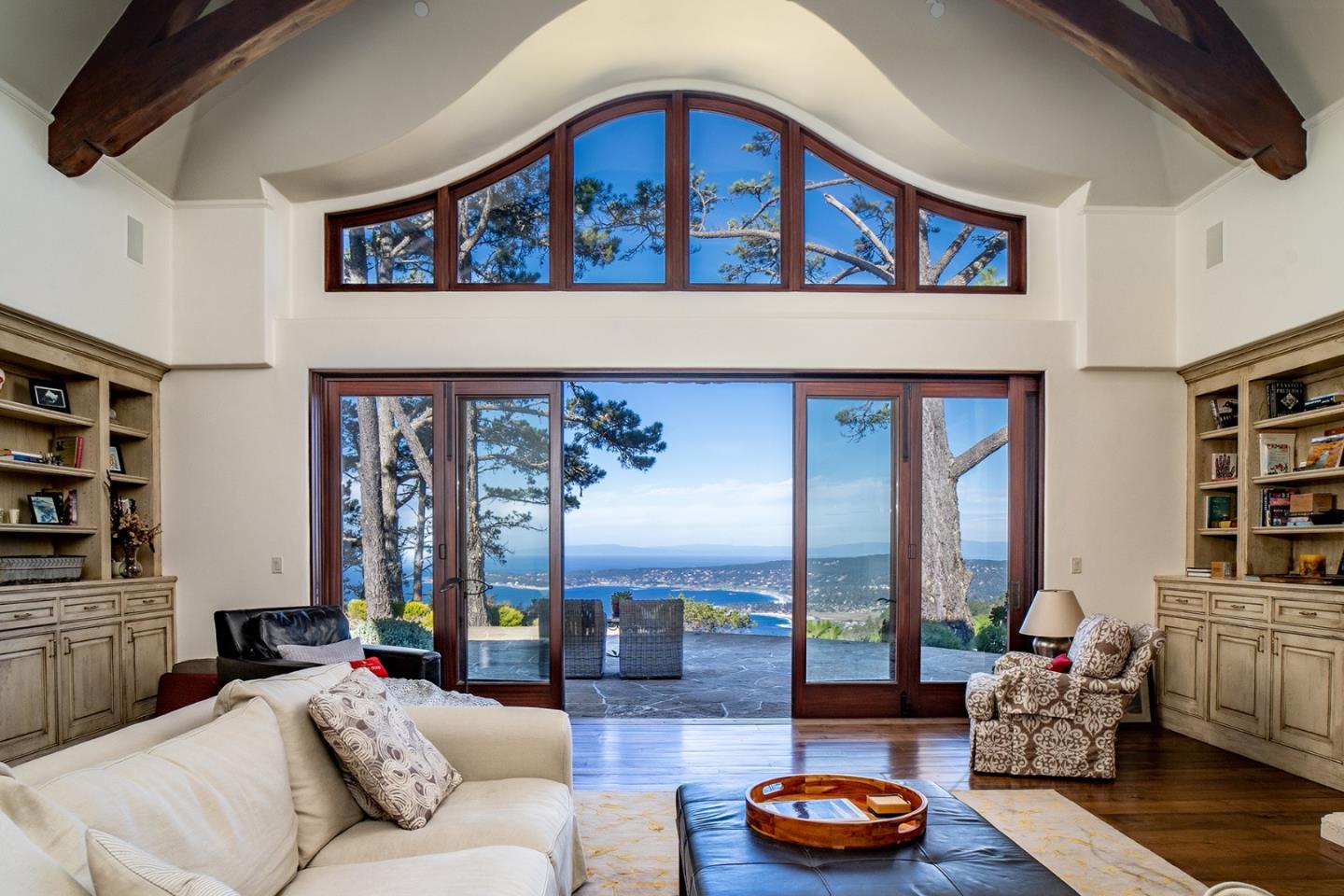 309 Mt Devon Road Carmel, CA 93923 - Photo 2 of 32 a living room with furniture and a large window
