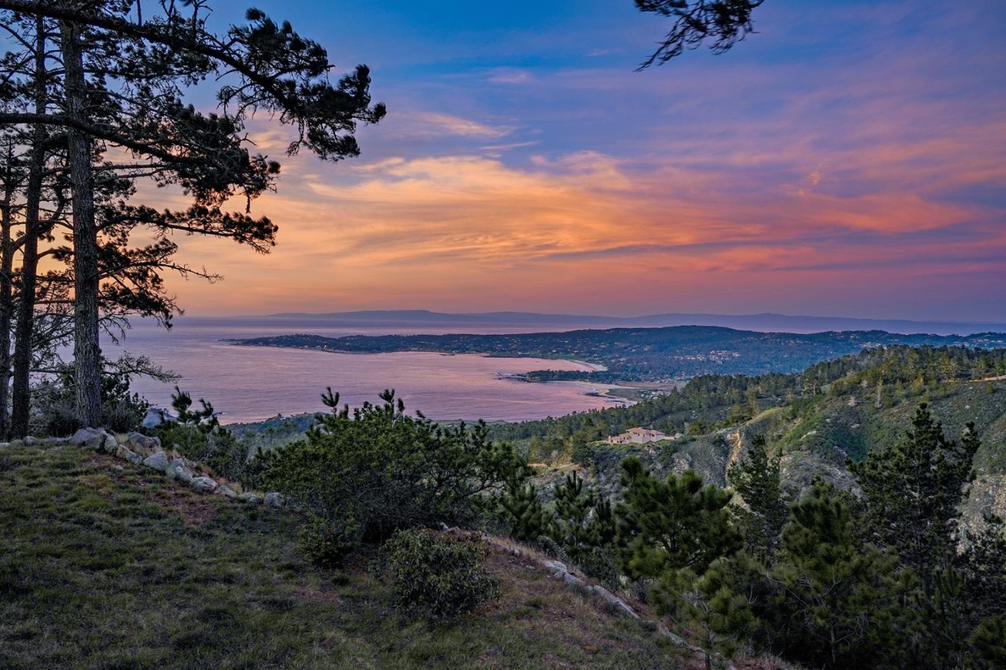 309 Mt Devon Road Carmel, CA 93923 - Photo 22 of 32 a view of a city with sunset