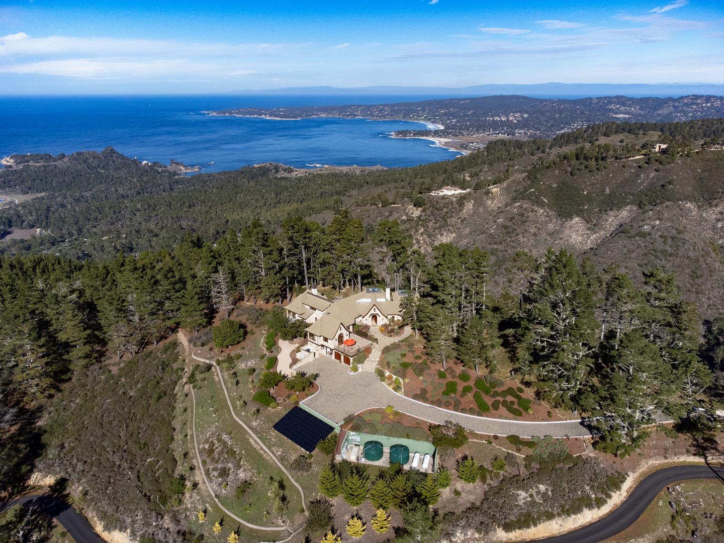 309 Mt Devon Road Carmel, CA 93923 - Photo 7 of 32 a view of a city from a lake