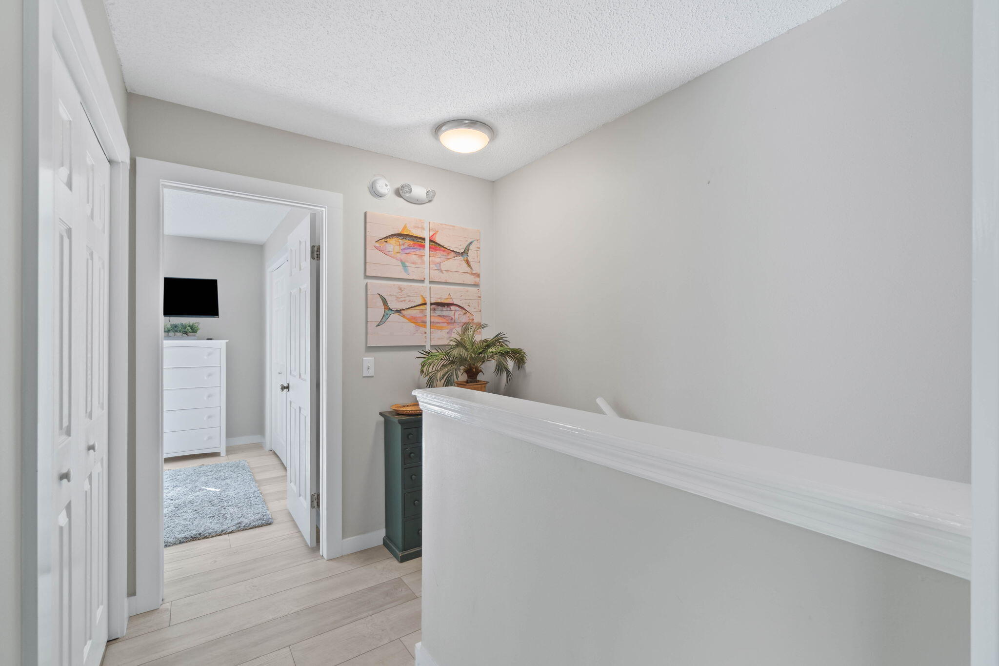 15 Cypress Street, Unit 268 Santa Rosa Beach, FL 32459 - Photo 19 of 44 a view of hallway with wooden floor