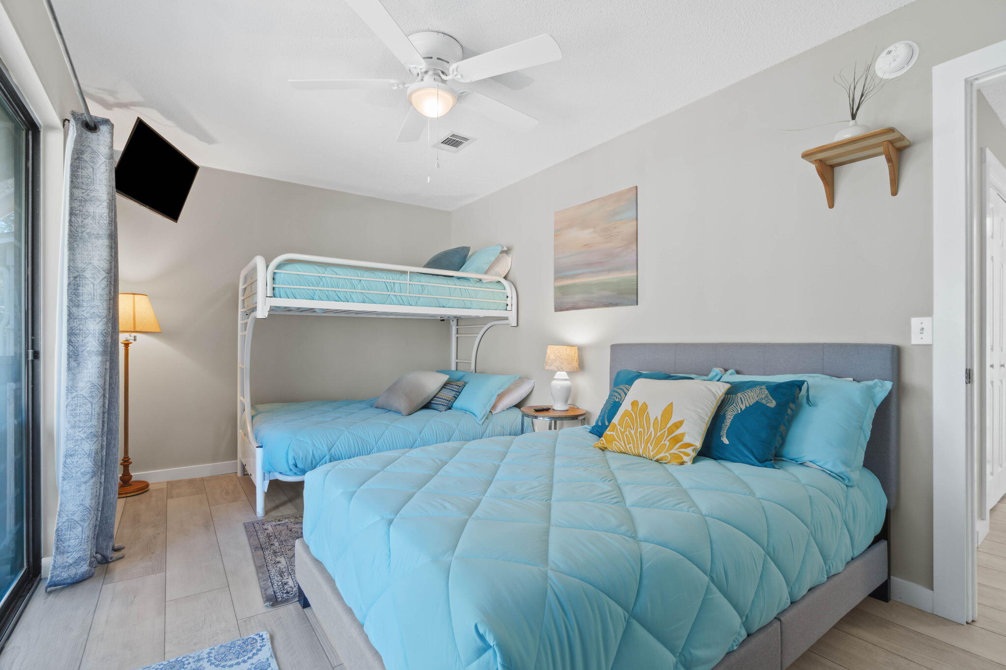 15 Cypress Street, Unit 268 Santa Rosa Beach, FL 32459 - Photo 25 of 44 a bedroom with a bed and a chandelier