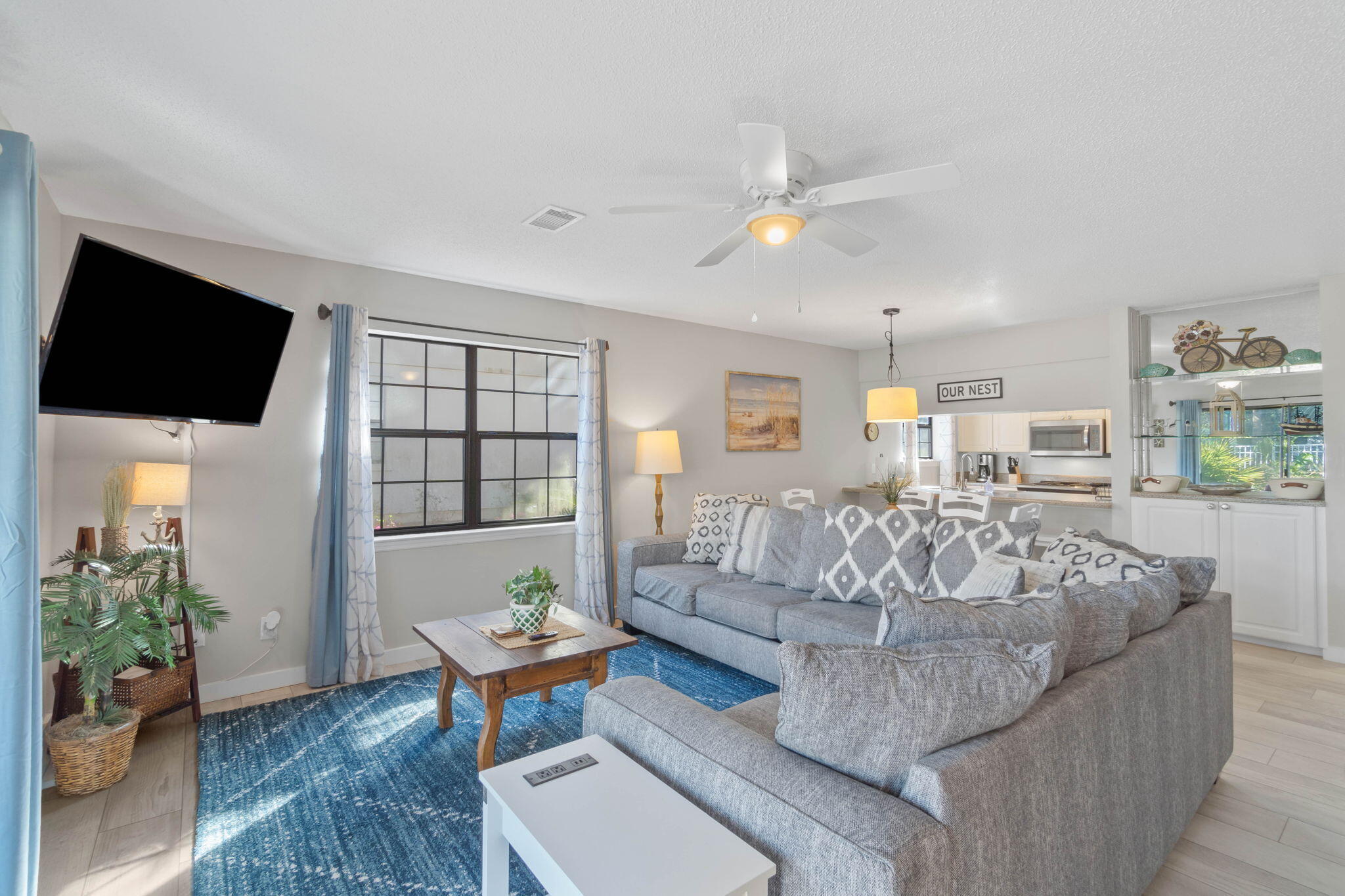 15 Cypress Street, Unit 268 Santa Rosa Beach, FL 32459 - Photo 3 of 44 a living room with furniture and a flat screen tv