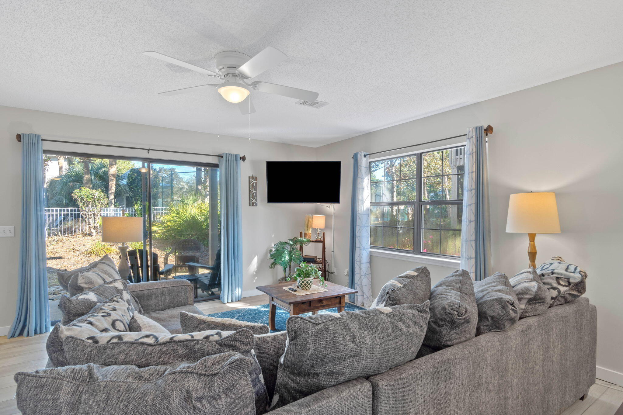 15 Cypress Street, Unit 268 Santa Rosa Beach, FL 32459 - Photo 5 of 44 a living room with furniture and a flat screen tv