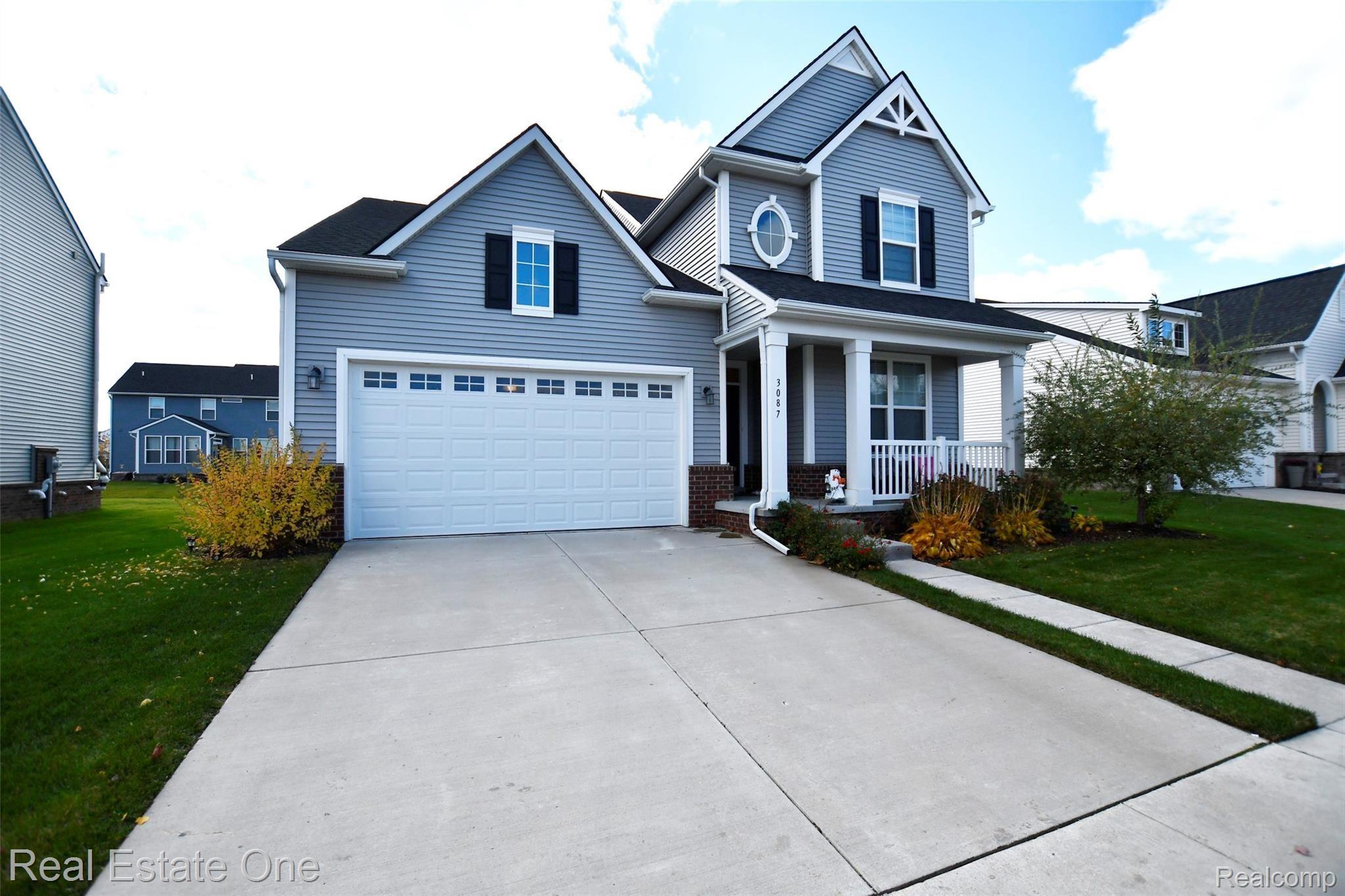 3087 Curtis Road Wixom, MI 48393 - Photo 2 of 36 House Front.jpg
