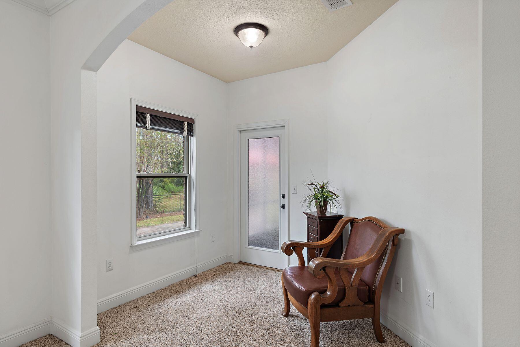 114 South Knightsbridge Court Santa Rosa Beach, FL 32459 - Photo 22 of 46 Primary Sitting Area w/ Porch Door