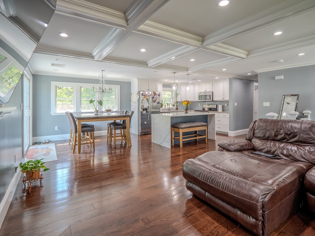 159 Mishawum Road Woburn, MA 01801 - Photo 4 of 41 a living room with furniture and a wooden floor