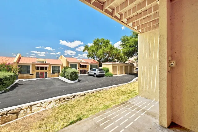 a view of a house with a swimming pool