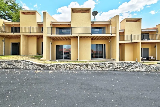 front view of a house with a street