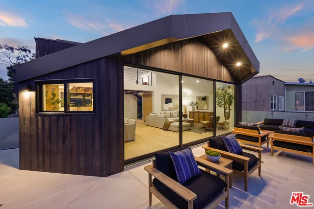 a outdoor space with patio couch and outdoor seating