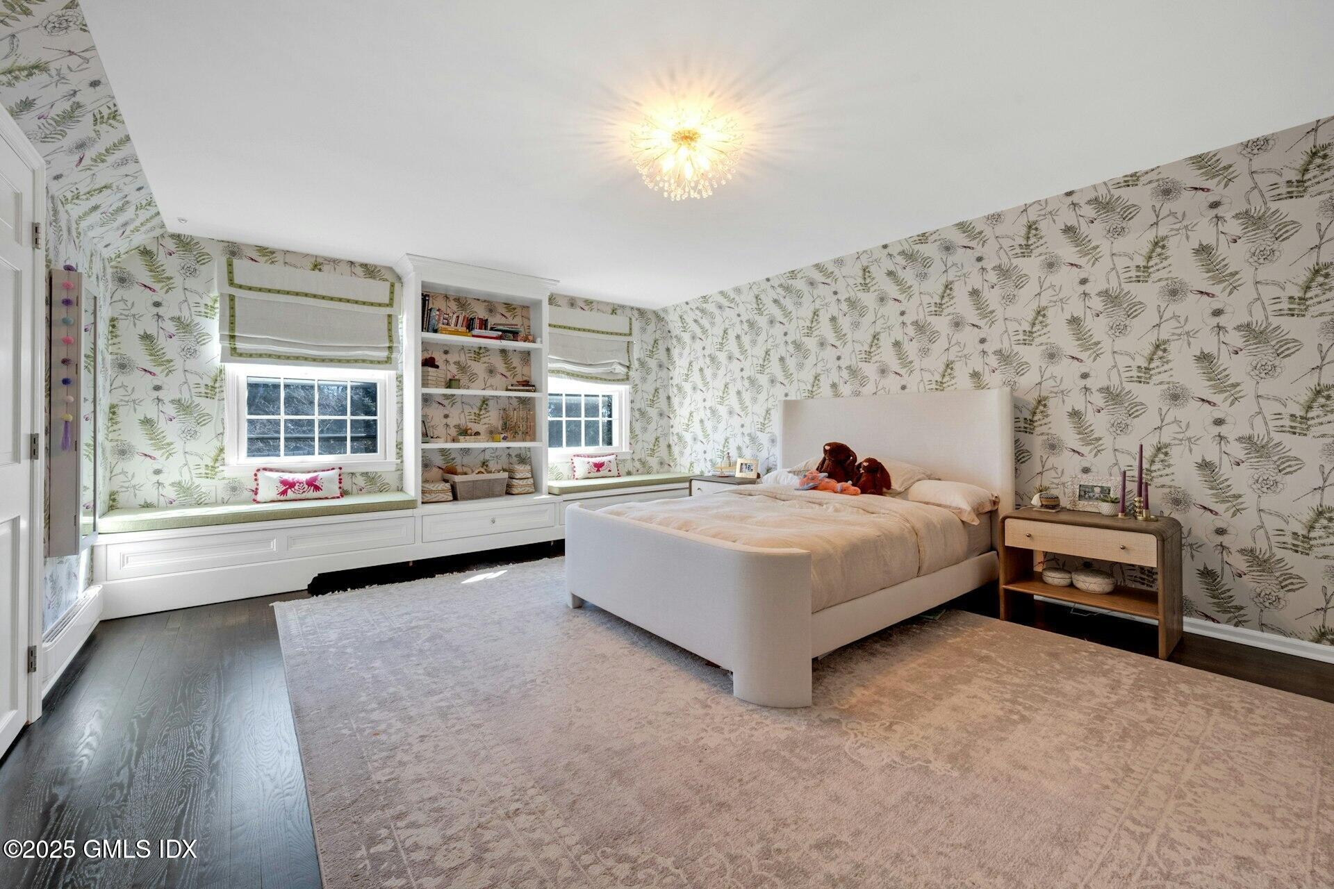 1 Ivanhoe Lane Greenwich, CT 06830 - Photo 14 of 27 a bed sitting in a room next to a window