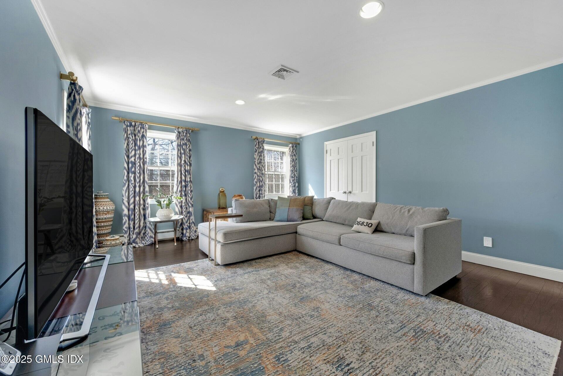 1 Ivanhoe Lane Greenwich, CT 06830 - Photo 16 of 27 a living room with furniture and a flat screen tv