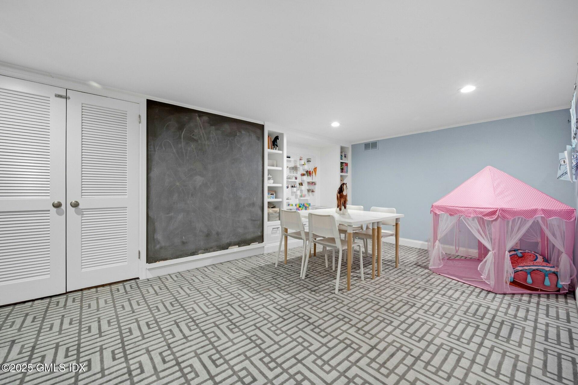 1 Ivanhoe Lane Greenwich, CT 06830 - Photo 18 of 27 a view of a dining room with furniture