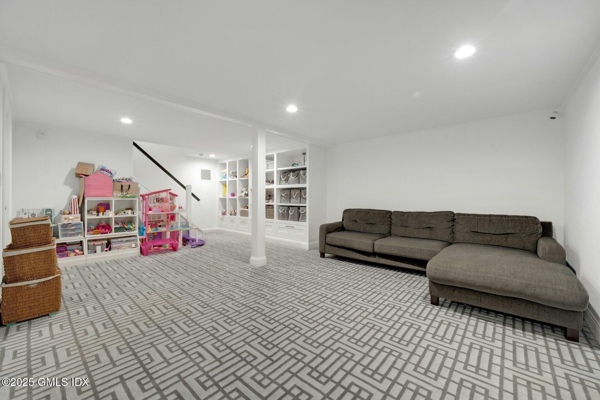 1 Ivanhoe Lane Greenwich, CT 06830 - Photo 19 of 27 a living room with furniture and white walls